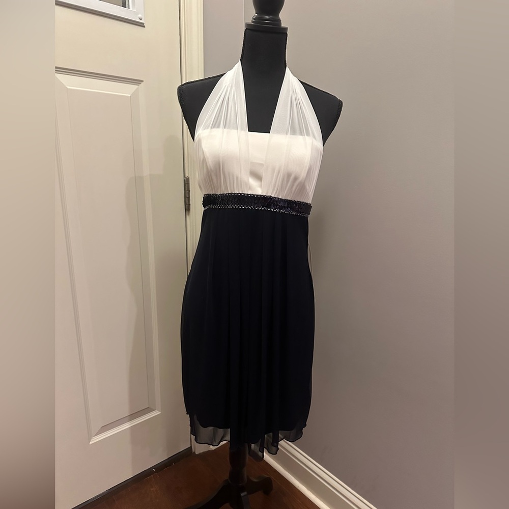 Black and white semi formal dress, size 10 but fits smaller